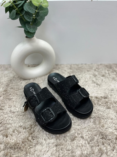 Claquettes noires brillantes femme